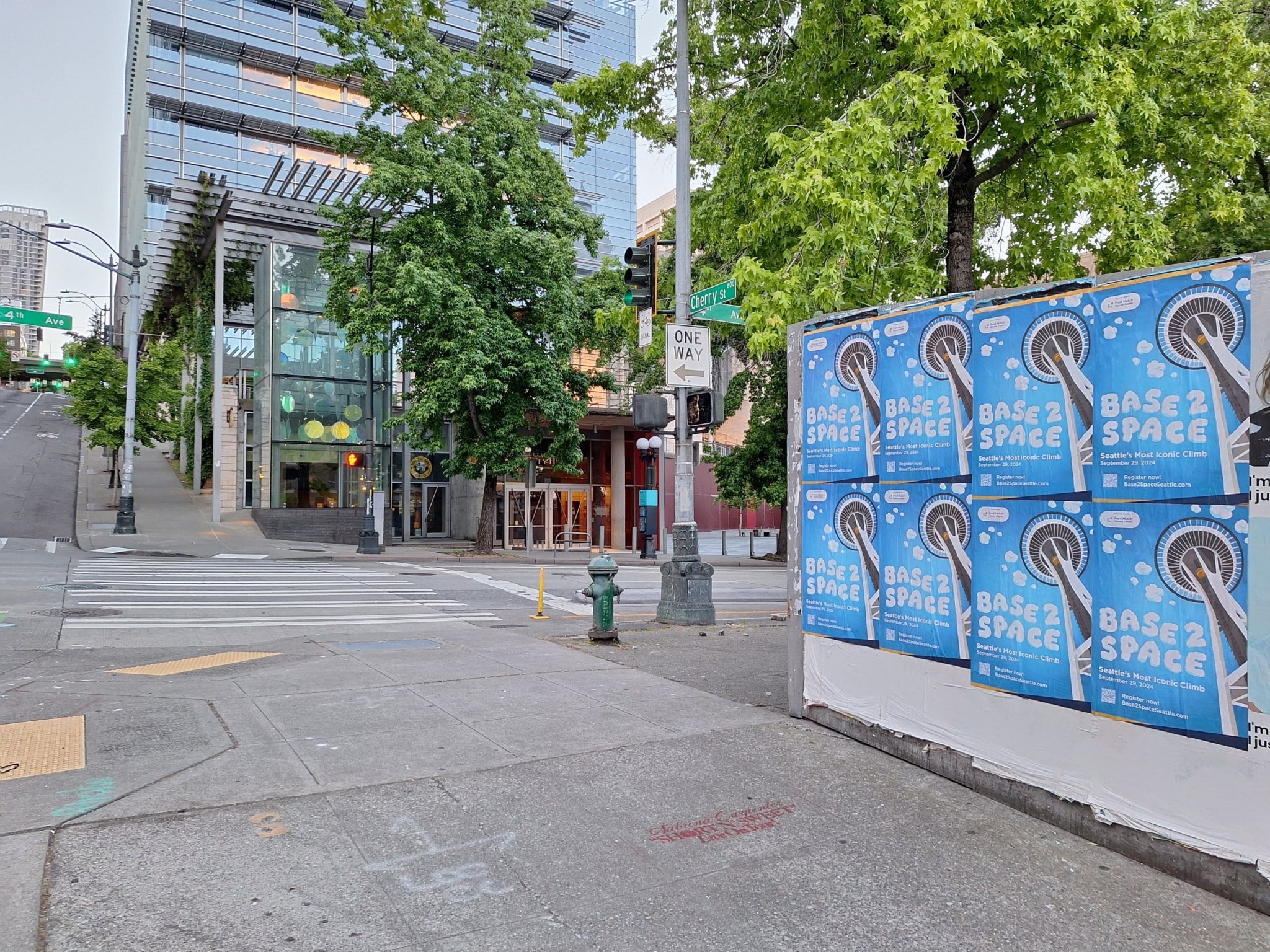 Base 2 Space Wild Posting® posters installed at a high-traffic downtown intersection