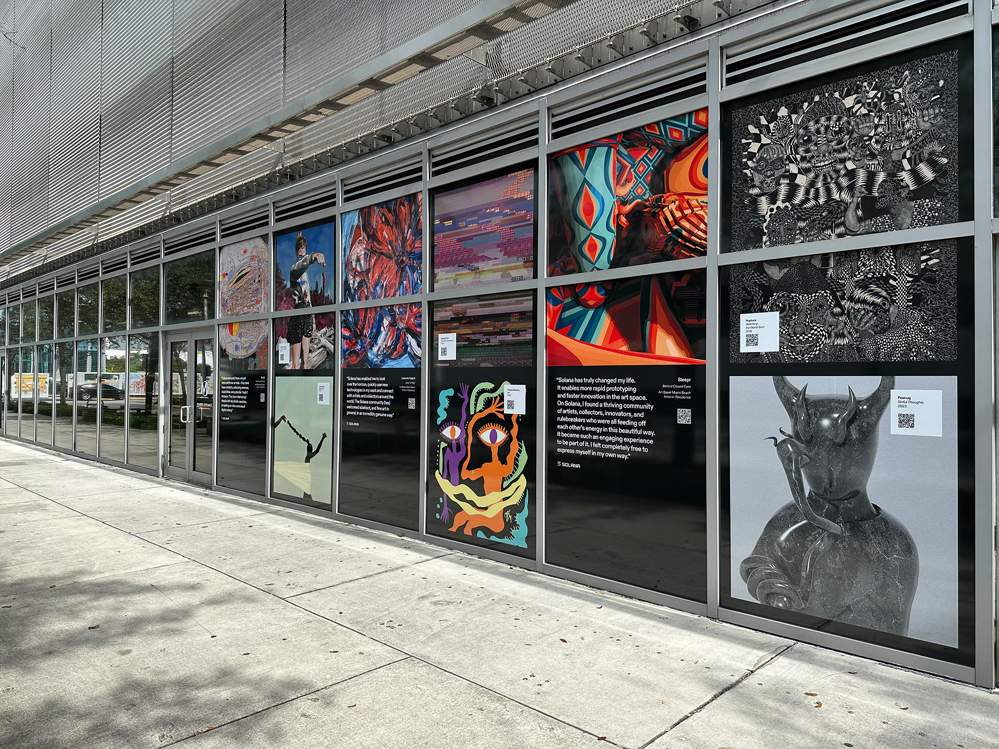 Solana street-level art installation featuring digital artwork displayed across a glass storefront in Washington DC
