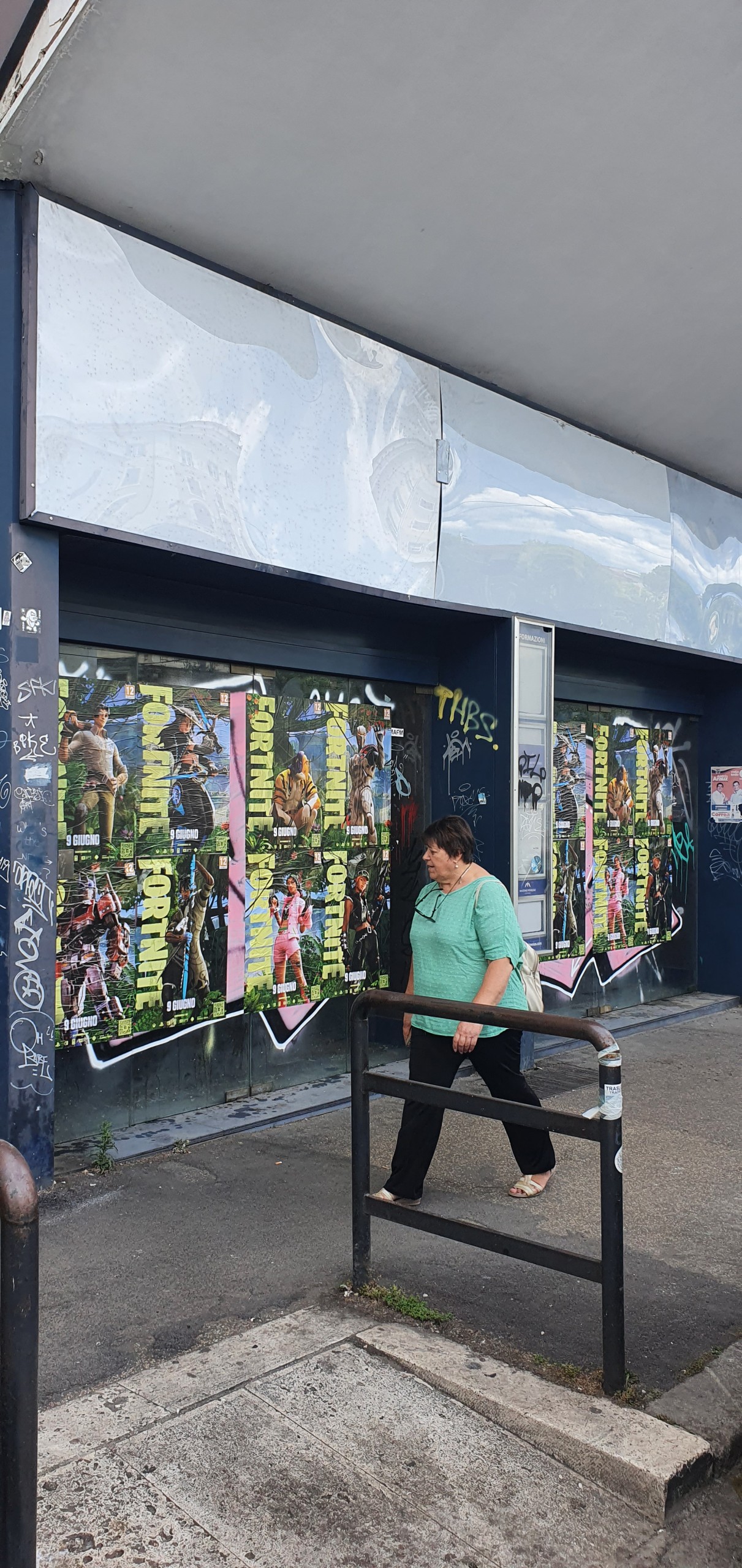 Street-level Wild Posting® Fortnite campaign installed across a high-traffic pedestrian location in Rome, Italy.