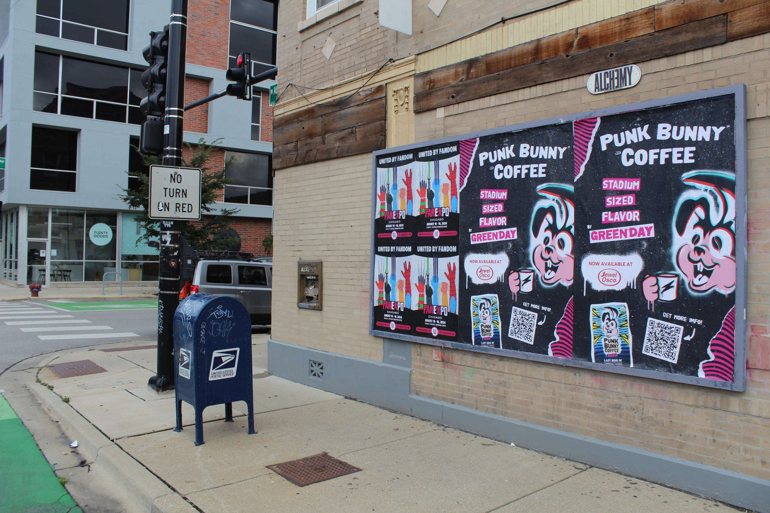 Wild Posting® posters for Punk Bunny Coffee by Green Day on a brick wall at N Damen Ave in Chicago, positioned at a street corner with pedestrian traffic.