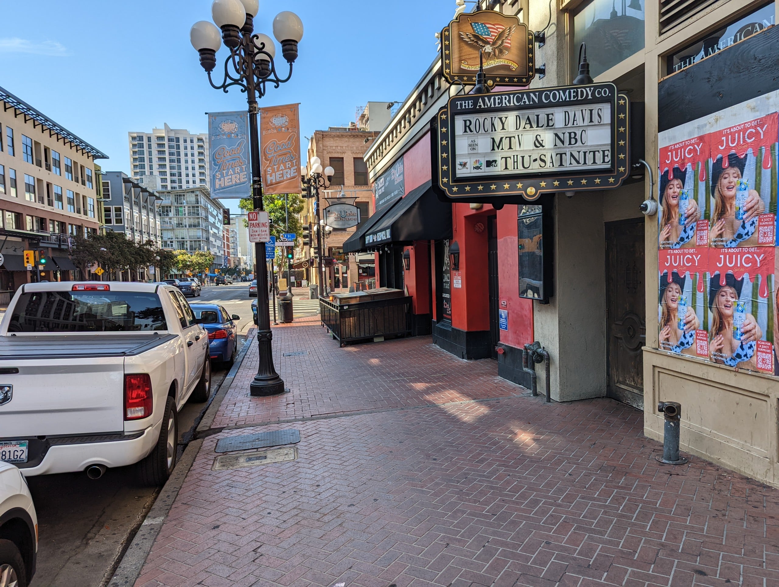 Wild Posting® campaign installed on a storefront in the Gaslamp Quarter of San Diego, California.